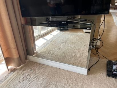 Two display stands of quadrangular cross-section...