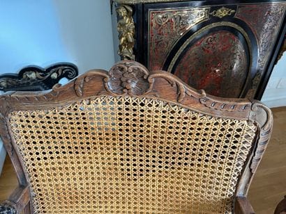 Suite of three caned armchairs in beech,...