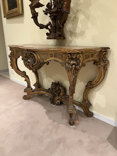 Importante console en bois doré ceinture...