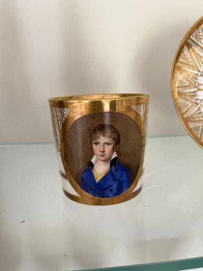 PARIS 
Porcelain litron cup and saucer, the...