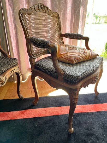 Suite of three caned armchairs in beech,...