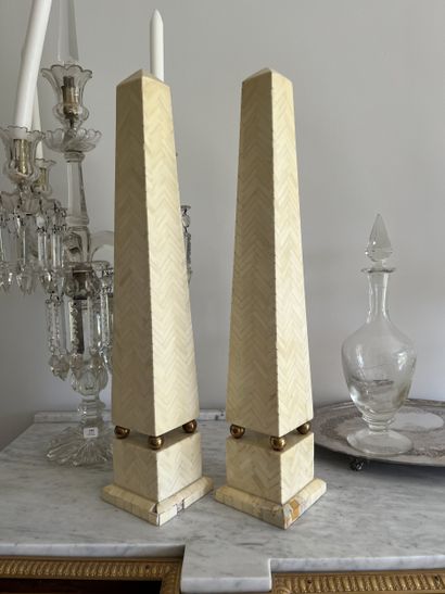 Pair of obelisks in galalith plates and gilded...