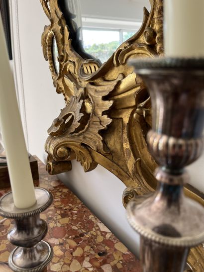 Stunning gilded wood mirror carved with foliage...