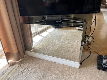 Two display stands of quadrangular cross-section...