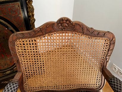 Suite of three caned armchairs in beech,...