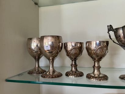 Two pairs of silver-plated metal goblets,...