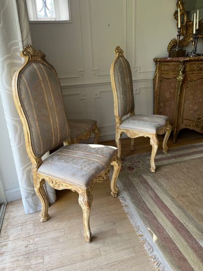 Suite of twelve chairs in lacquered wood...