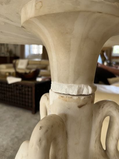 Octagonal pedestal table in composite white...