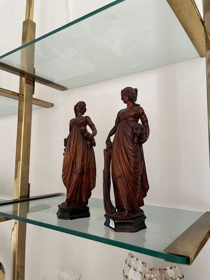 Pair of carved limewood statuettes, one depicting...