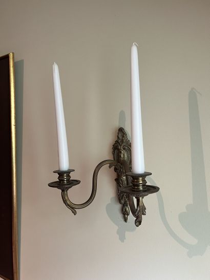 Pair of two-light ormolu sconces decorated...