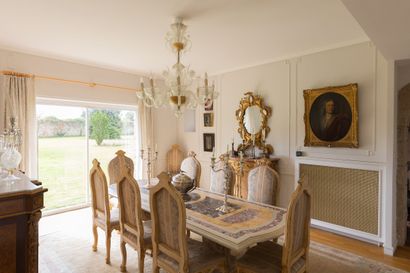 Table in cream lacquered wood, the top inlaid...