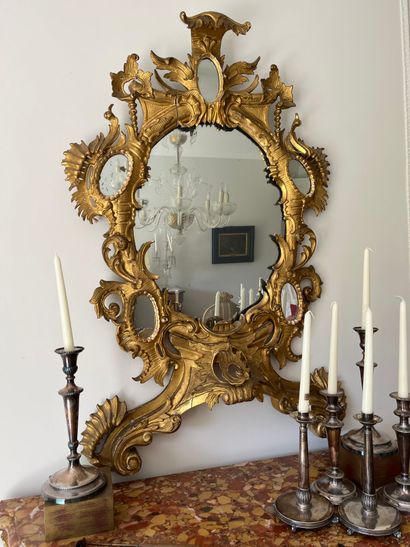 Stunning gilded wood mirror carved with foliage...