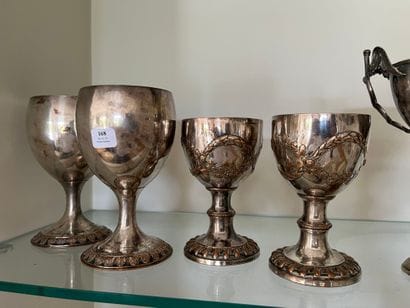 Two pairs of silver-plated metal goblets,...