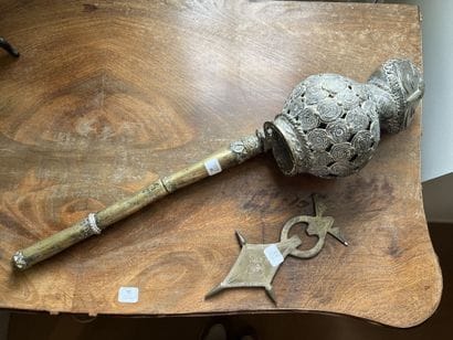 Bronze pipe. Length: 50 cm. Cameroon. 
And...