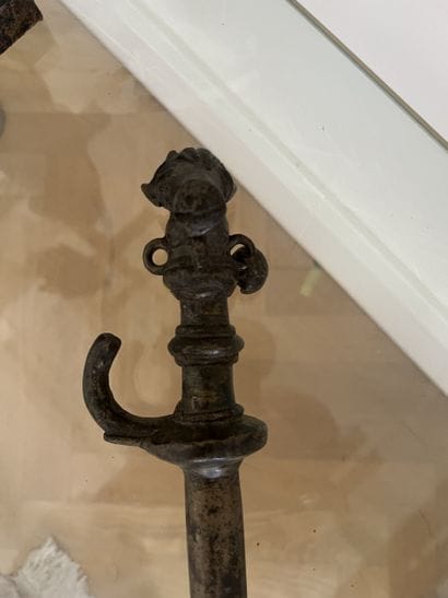 Bronze scepter. The handle is adorned with...