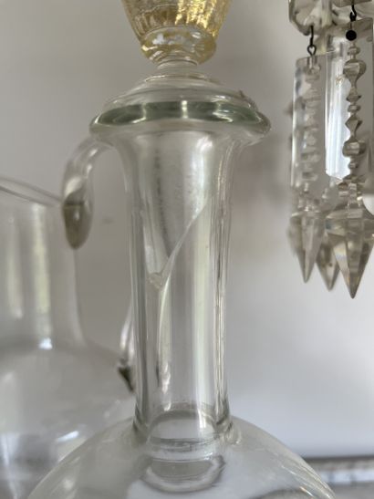 Three glass decanters, one with engraved...