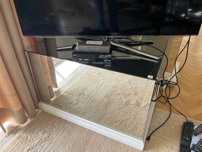 Two display stands of quadrangular cross-section...