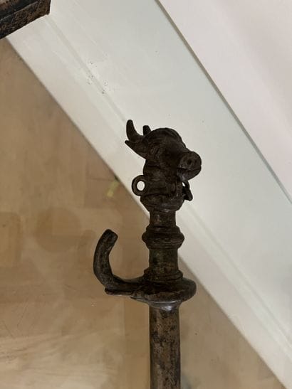 Bronze scepter. The handle is adorned with...