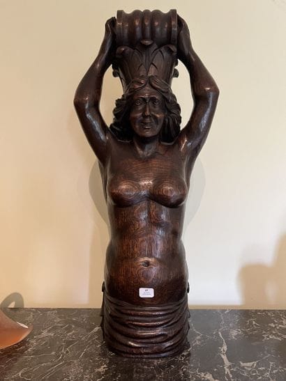 Sconce sculpture in stained oak representing...
