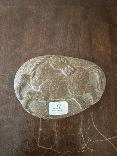 Set of three antique-inspired carved pebbles...