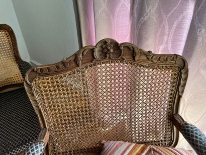 Suite of three caned armchairs in beech,...