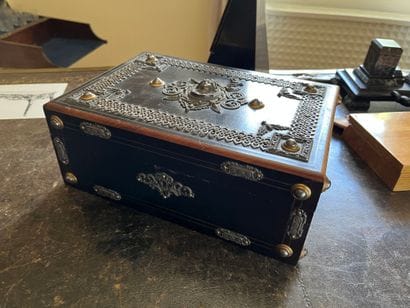 Ebony veneer and blackened wood case, brass...