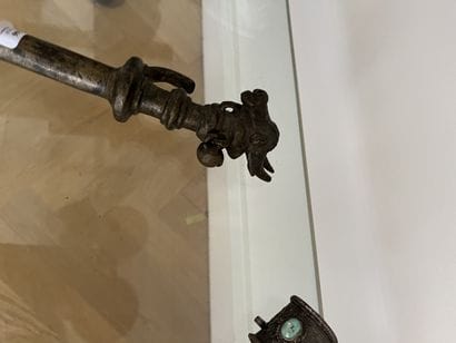 Bronze scepter. The handle is adorned with...