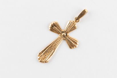 Yellow gold cross with fluted design and...
