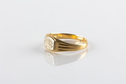 Chevalière in yellow and white gold engraved...