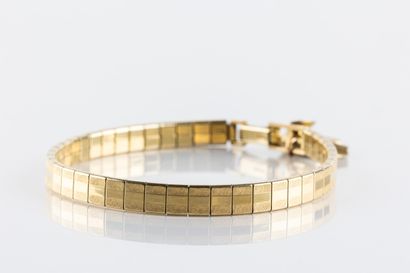 AMERIC 
Bracelet en métal doré, maille plaquette...