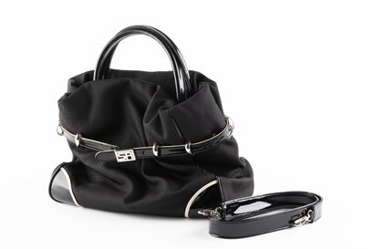 SONIA RYKIEL
Sac à main en toile noire, gainé...