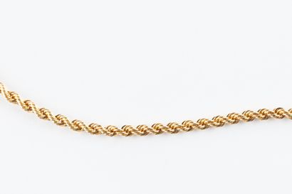 Yellow gold set comprising a drop necklace...