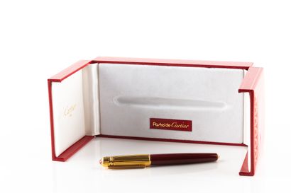 Stylo roller CARTIER Pasha en métal doré...