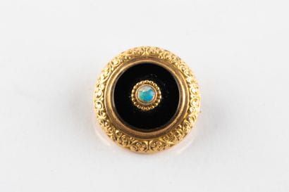 Broche circulaire en or jaune, centrée d'une...