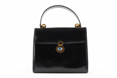 GUCCI
Sac forme cartable en cuir lisse noir,...