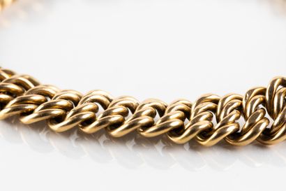 Bracelet en or jaune double maille gourmette...