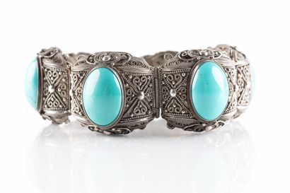 Bracelet en argent composé de motifs semi-bombés...