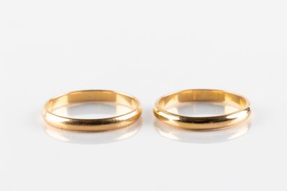 Set of two gold wedding rings. 
Weight: 6.46...