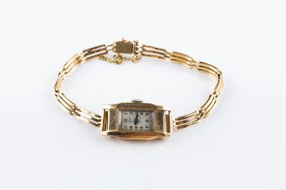 MIC vers 1960/65. 
Montre bracelet en or,...