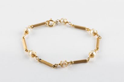 Yellow gold bracelet with rigid, rectangular...
