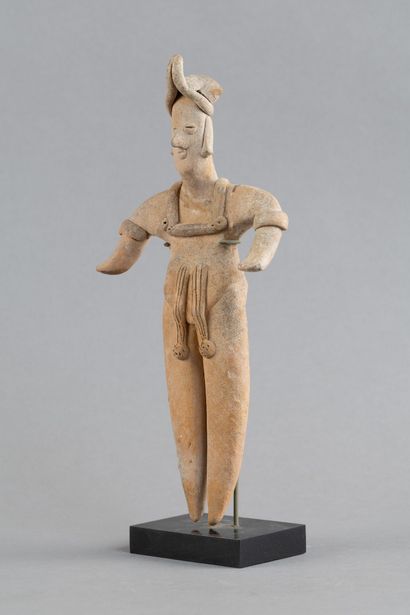 Statuette depicted in a standing position....