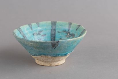 Ceramic bowl with a black radiating pattern...