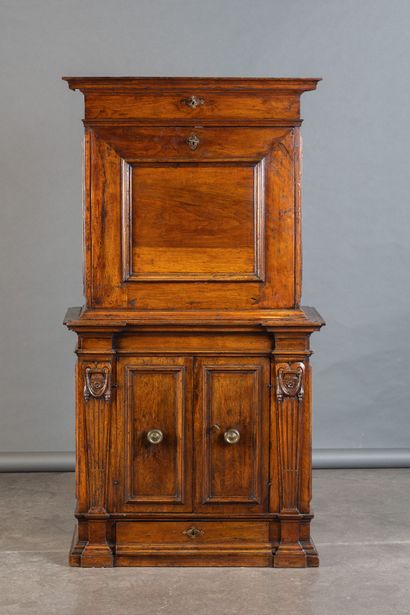 Walnut cabinet with secret compartments;...
