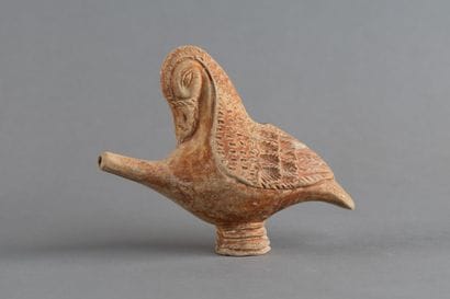 Guttus représentant un oiseau sur piédouche...