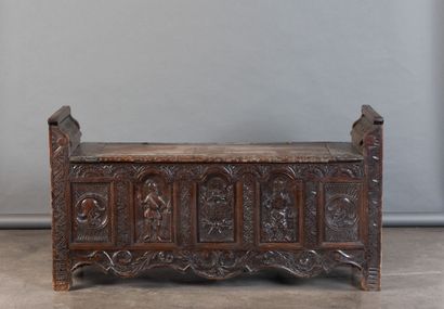 Oak storage bench with a five-panel carved...
