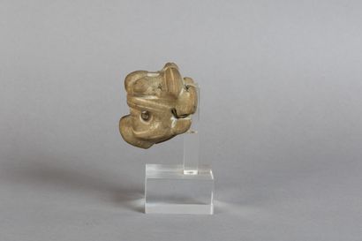 Zoomorphic weapon-shaped object depicting...