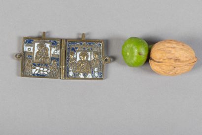 A diptych travel icon depicting the Virgin...