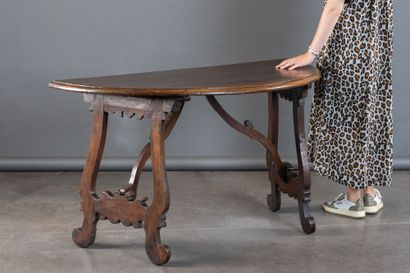 Walnut console table, lyre-shaped legs, half-moon...