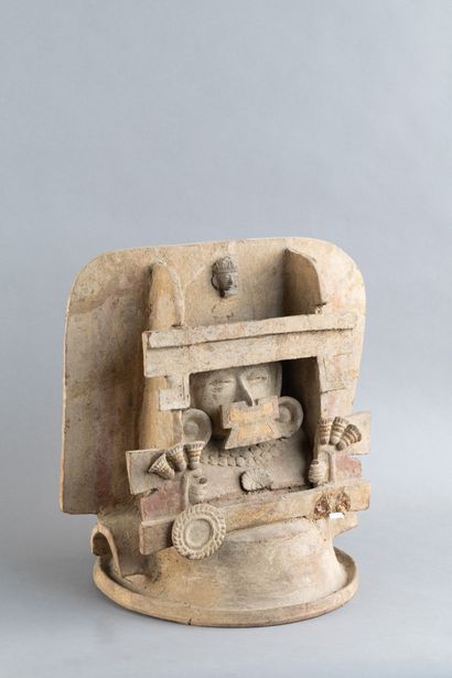 Lid of a censer. In the center, the face—adorned...