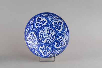 Ceramic plate decorated with blue-and-white...